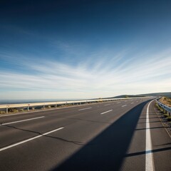 Panoramic view of the open road with cloudscape and clear blue sky