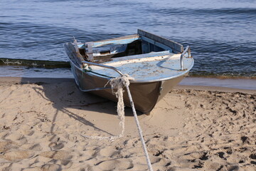 old boat on shore
