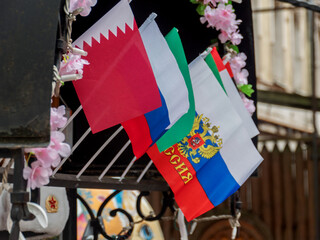 Flags of Qatar and Russia on Display