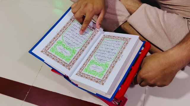 Daily Routine: Finger Tracing the Arabic Quranic Text