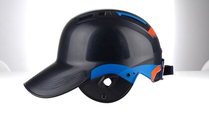 Side view of a dark-colored baseball helmet with a brim and decorative accents.