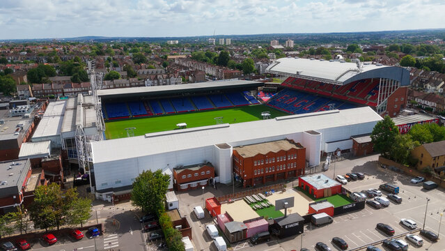 LONDON, UK - AUGUST 5, 2025 - Aerial view of Selhurst Park, home of Crystal Palace FC, showing the stadium and surrounding area on a sunny summer day
