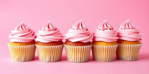 A row of six pink frosted cupcakes sits on a matching pink background, cupcakes, baked goods