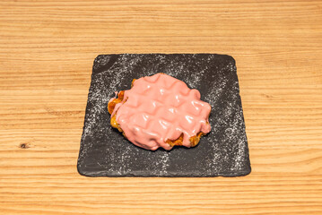 Fresh Sliced Strawberry Waffles: seasonal fruit macerated in powdered sugar on a base of Chantilly cream"