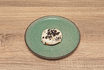 Crispy, freshly baked puff pastry palmiers, covered in a white vanilla glaze and decorated with chocolate strands.