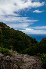 Naklejka premium mountain landscape with blue sky cliffs and ocean