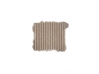 Torn corrugated cardboard piece isolated on white background