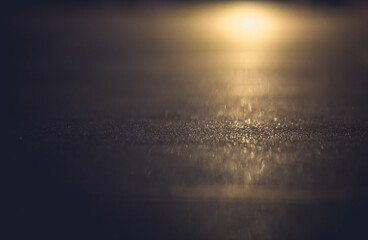 Abstract light on concrete road. Street light blur bokeh background.