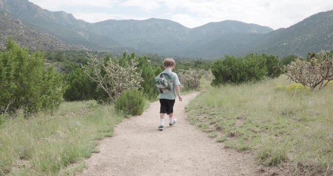 Small Boy Hiking in the Foothills in Albuquerque NM