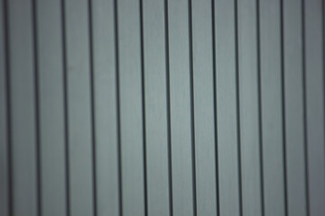 Pattern of vertical grey stripes. An abstract and minimalist architectural background