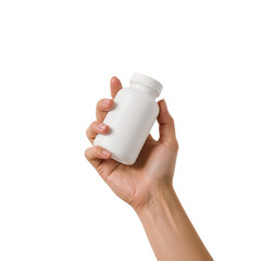 Hand holding a white medicine bottle against a black background showcasing health
