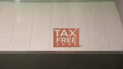 Tax free zone sign in retail establishment window
