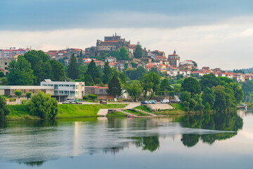 Fototapeta premium The view of the town of Tui by Mino River in Spain
