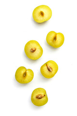Fresh green plum fruit on white background.