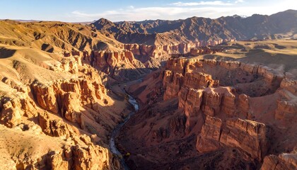 Obraz premium High-altitude view of a dramatic canyon carved by erosion.