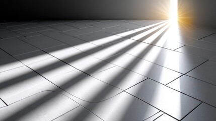 A modern room with sleek gray tiles illuminated by sunlight streaming through a door.