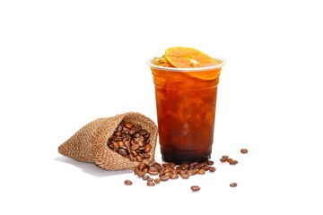 Americano ice coffee serving on wooden plates ,orange juice slices topping. Isolation concept.