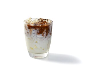 Coffee beans spread around glass,latte ice coffee put one white background.