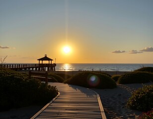 Obraz premium Tranquil Beach Sunset with Wooden Boardwalk and Pier