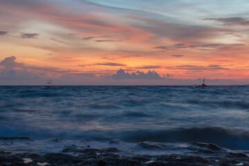 Long Exposure Island Seaside Sunset With Soft Wave Motion