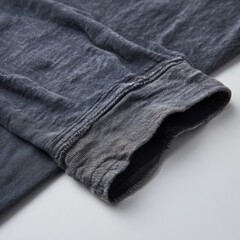 A black shirt with a grey sleeve