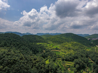 High Definition Aerial View Of Lush Green Rolling Hills Landscape