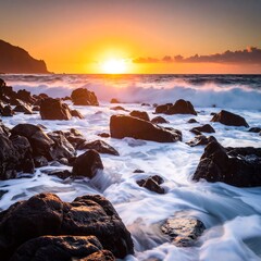Vibrant sunrise over ocean waves crashing on dark rocks