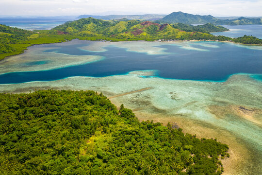 Scenic Aerial Panorama Drone Picture of Abanay Island with East and Middle Bucas Island in the Background, Siargao, Surigao del Norte, Mindanao Philippines
