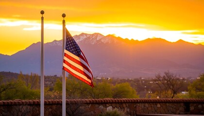 American flag waving at sunset over mountains (1)