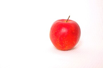 small size red apple on white background
