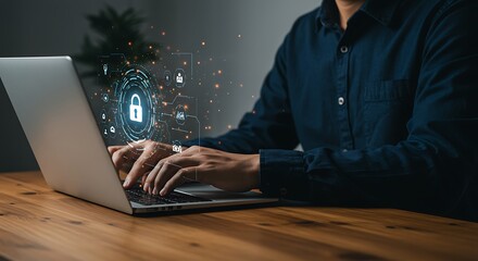 Person using laptop with a digital security interface.