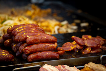 a classic combination from a Taiwanese night market or food stall: grilled sausage and sticky rice sausage