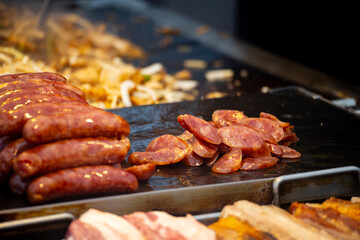 a classic combination from a Taiwanese night market or food stall: grilled sausage and sticky rice sausage