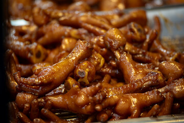 a plate of classic Taiwanese traditional delicacy—braised chicken feet