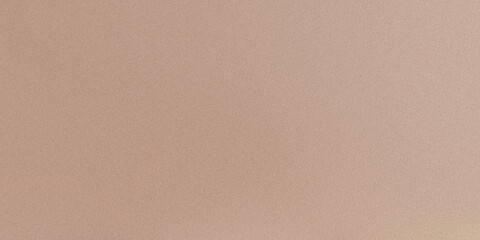 A textured beige background with a subtle grain creates a soft and delicate surface for various design and artistic applications