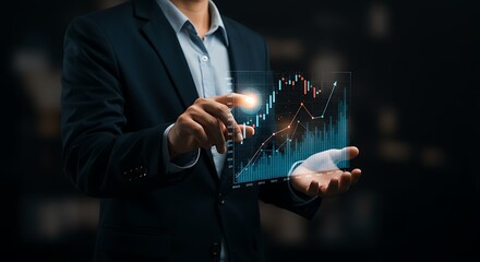 Businessperson presenting a digital  market graph.