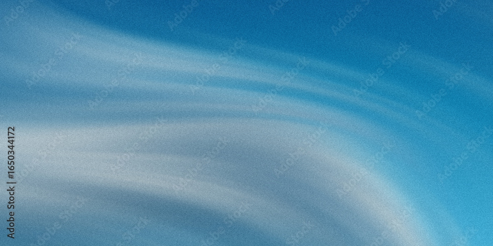 Wall mural a dreamy abstract texture blends shades of blue, creating a soft, grainy background pattern reminisc
