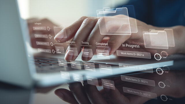Data management, Business developer using Kanban board framework on laptop computer. Agile software development, document, database management concept. Business and technology background