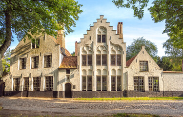 Historical streets and alleys of the Beguinage in the old city Bruges (Brugge), East Flanders, Belgium