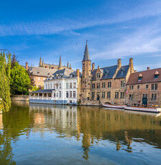 Boat tour of the picturesque canals of the old city of Bruges (Brugge), East Flanders, Belgium