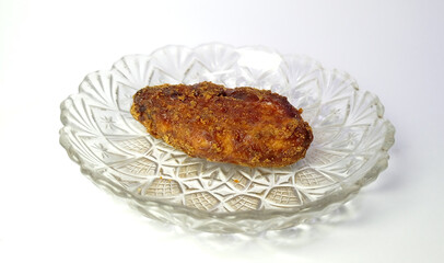 Fried Chicken Tender on Clear Decorative Glass Plate in White Background