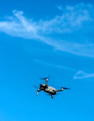 Drone flying in clear sky