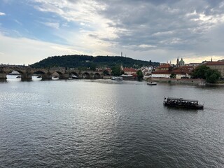 Obraz premium Vltava River in Prague with historic city view