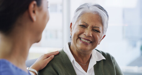 Obraz premium Caregiver, comfort and elderly woman at house for good news, assistance and medical results. Nurse, support and senior person for healthcare advice, helping hand and patient diagnosis at nursing home