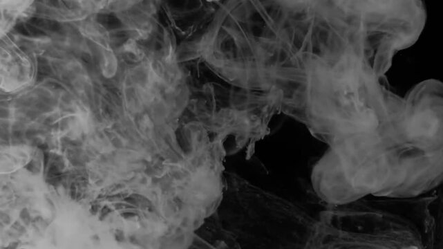 Realistic white smoke with black background.