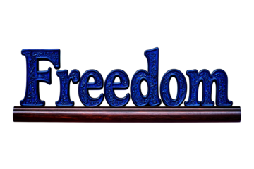 Ornate Blue Lettering Spell Freedom on Dark Wood Base