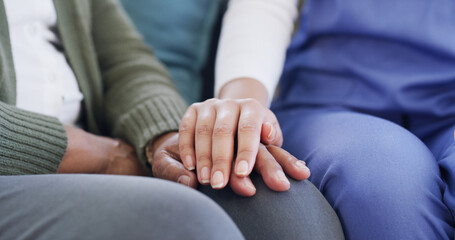Senior care, holding hands and caregiver in nursing home, compassion and medical assistance or help. Nurse, kindness and support for elderly patient with illness, people and empathy for healthcare