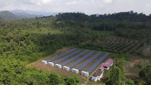 Installation of solar panels in the middle of agricultural and forest areas in the rural area of Merabu, Berau Regency, East Kalimantan, Indonesia. Solar panel technology is utilized for remote areas 