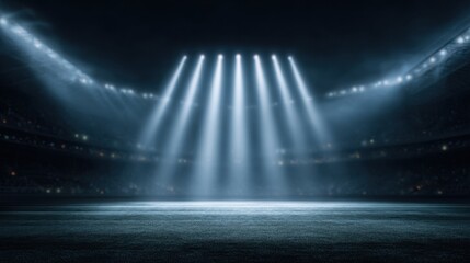 A dimly lit stadium with powerful spotlights illuminating the field, creating an atmospheric scene ready for a sporting event.