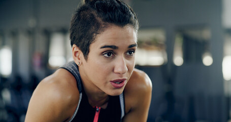 Tired, breathing and fitness with woman in gym for workout, exercise fatigue and sweating. Training...